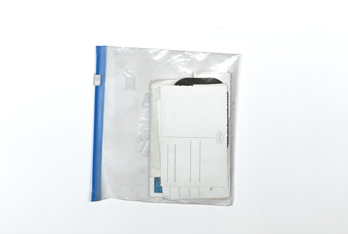 Notizbuch in einer Plastikhülle